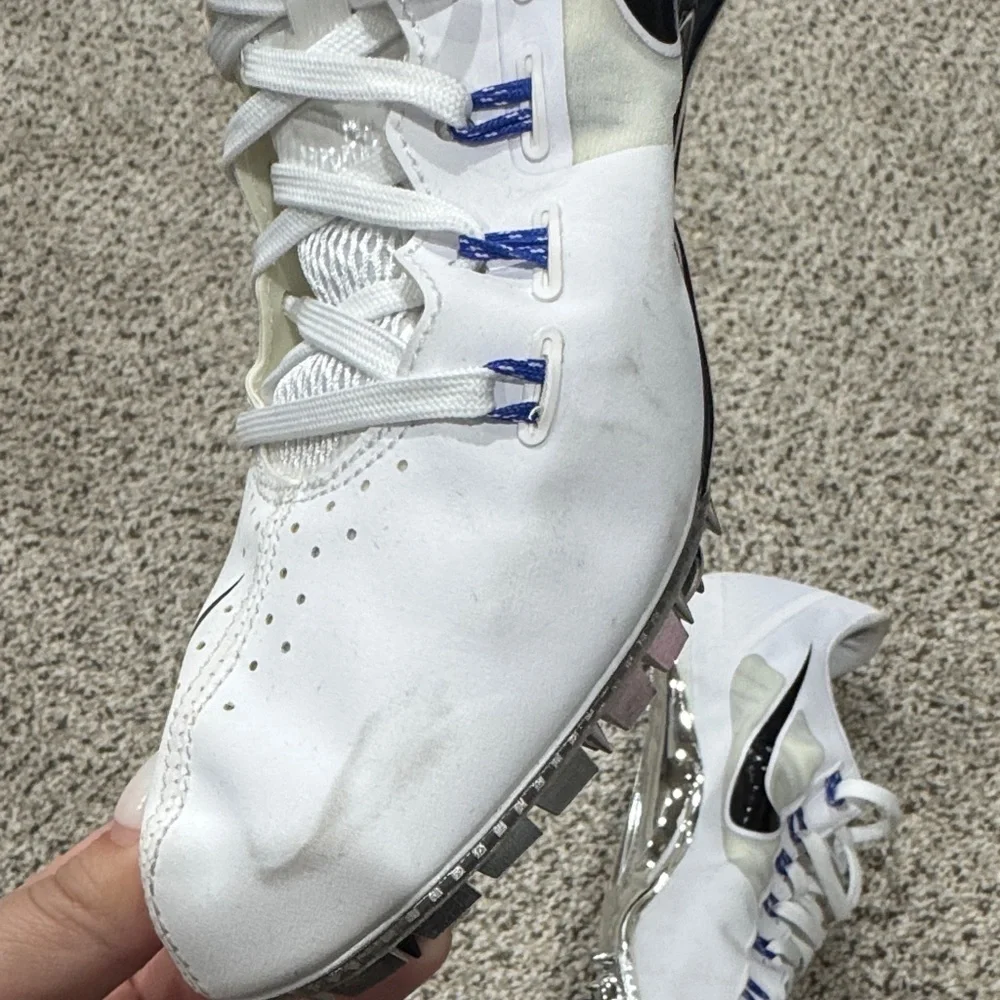 Nike fly wire White Track Spikes with Black Swoosh and Blue Accents